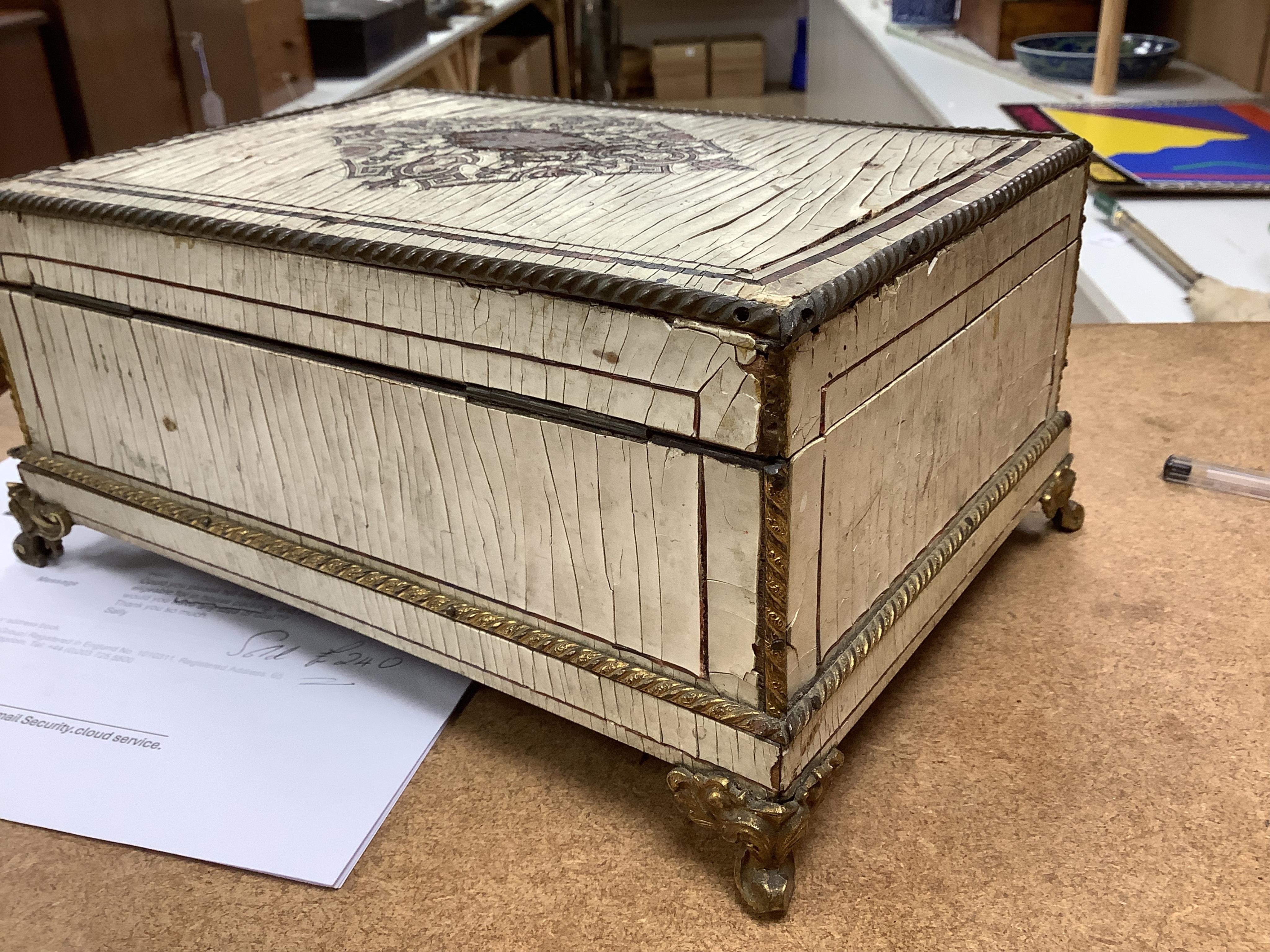 A 19th-century French tortoiseshell and faux lacquer work box, 24.5cm wide x 11.5cm high. Condition - poor to fair